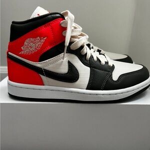Air Jordan 1 Mid Newsprint, brand new, never worn, women’s size 7